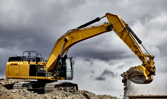 excavator digging the earth dry equipment hire
