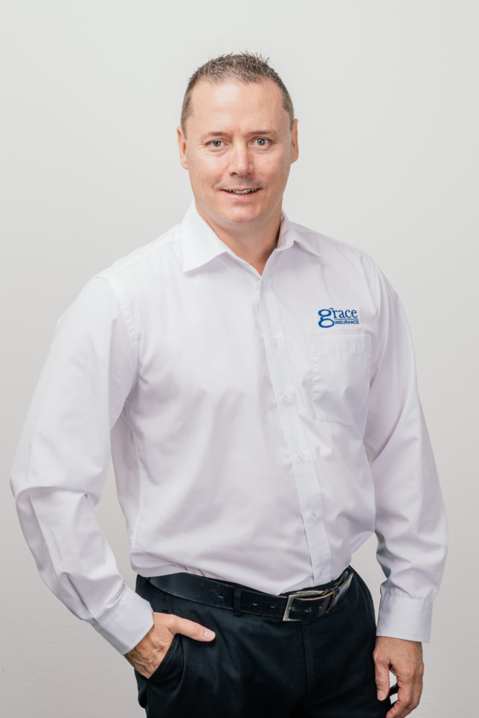 Profile shot of Frans Perth Insurance broker in white shirt